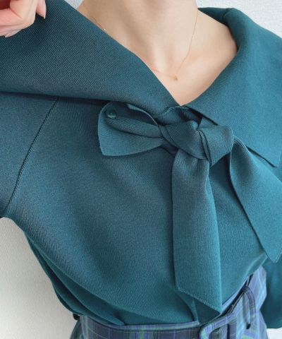 blue green / tie release button